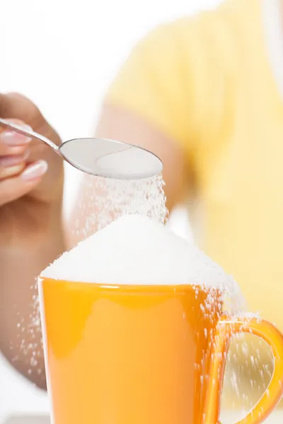 Cup full of sugar — Stock Photo, Image