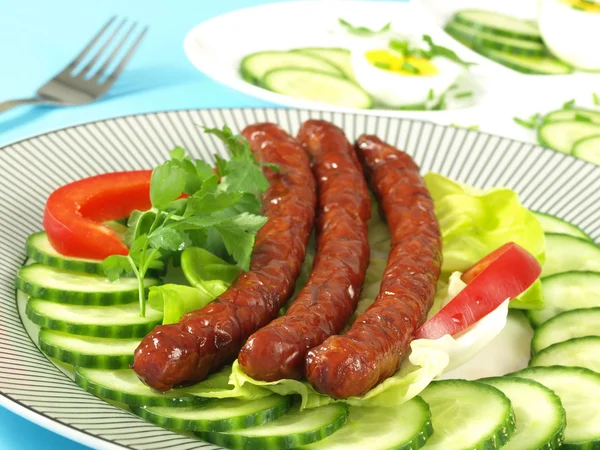 Fried tasty sausages for breakfast — Stock Photo, Image