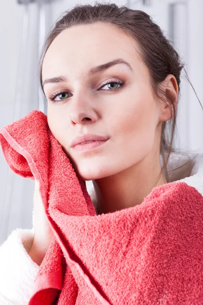 Woman wiping the face — Stock Photo, Image