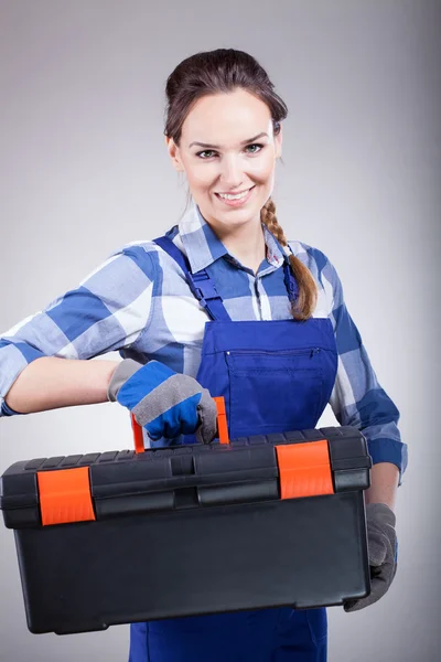 Handywoman with a toolbox — Stock Photo, Image