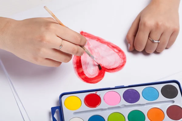 Pinturas pintadas de corazón sobre papel — Foto de Stock