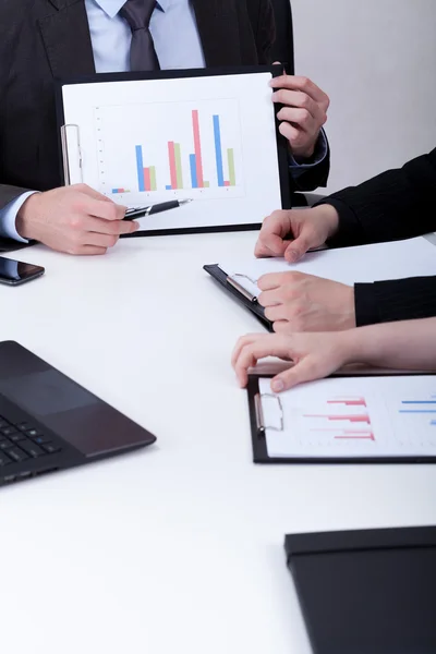 Presenting company profits on a meeting — Stock Photo, Image