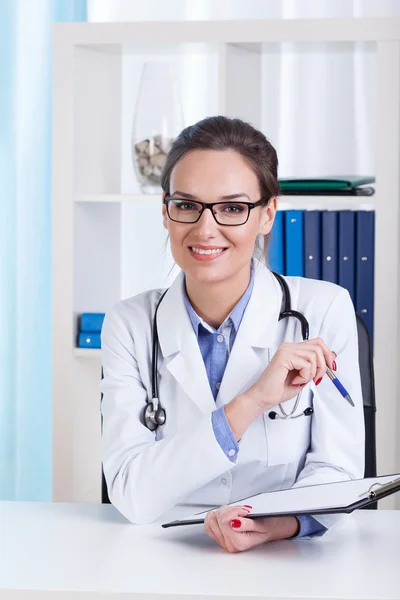 Smiling lady doctor with glasses — Stock Photo, Image