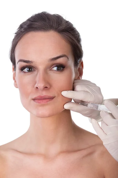 The doctor does injection to the face of woman — Stock Photo, Image