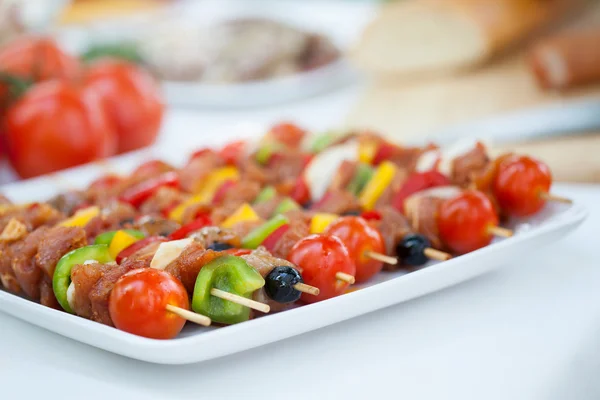 Delicious skewers on barbecue — Stock Photo, Image
