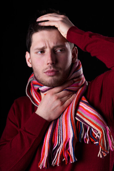 Ill man with sore throat