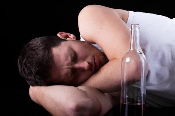 Sleeping male alcoholic — Stock Photo, Image