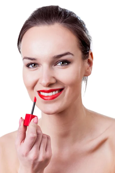 Mulher atraente fazendo maquiagem — Fotografia de Stock