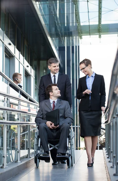 Businessman and his co-workers — Stock Photo, Image