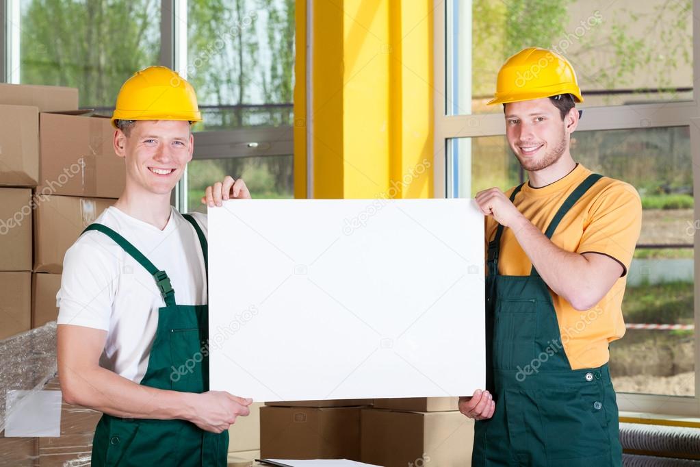 Workers with blank board