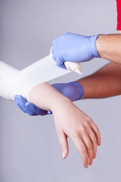 Bandaging of forearm — Stock Photo, Image