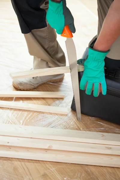 Man with handsaw — Stock Photo, Image