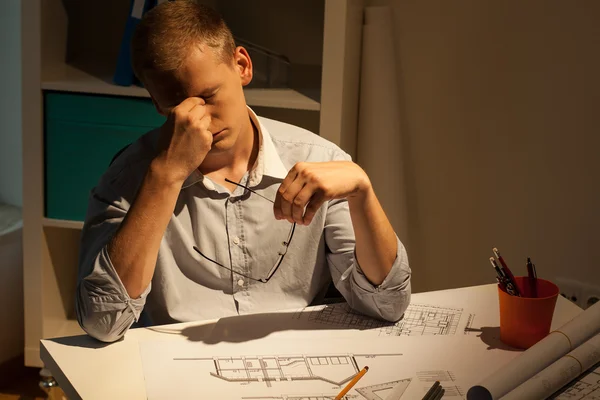 Tired architect at night — Stock Photo, Image