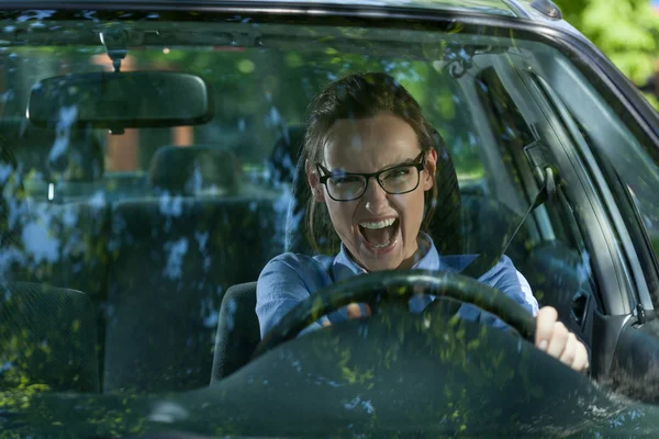 Mad woman in a car — Stock Photo, Image