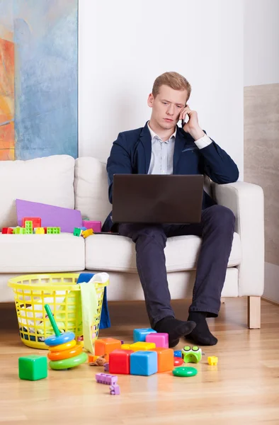 Businessman trying to work — Stock Photo, Image