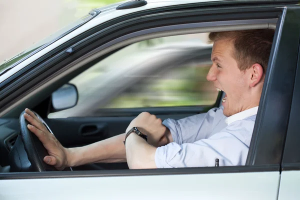 Businessman driving fast his car — Stock Photo, Image