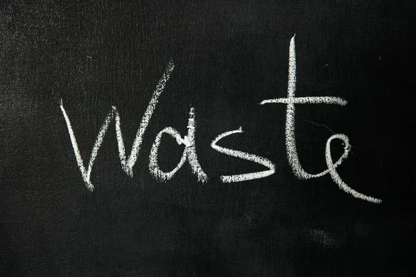 "Waste" on blackboard — Stock Photo, Image