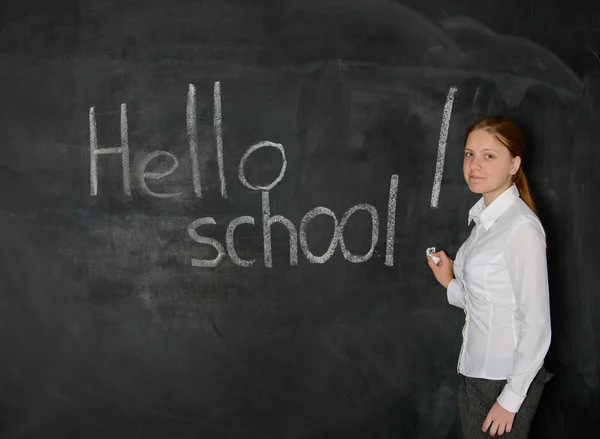 Student op blackboard — Stockfoto