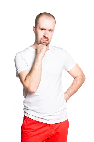 Homem bonito pensativo na t-shirt branca isolada no branco — Fotografia de Stock