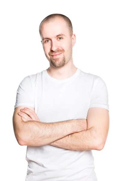 Handsome smiling young man with folded arms in white t-shirt isolated on white — Stock Photo, Image