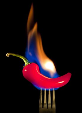 çatal üzerinde yanan kırmızı Şili