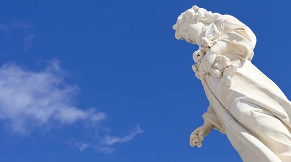 Angel statue over blue background — Stock Photo, Image