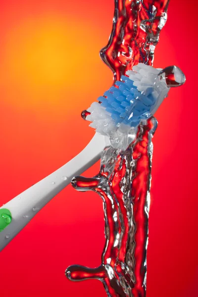 Splash Toothbrush — Stock Photo, Image