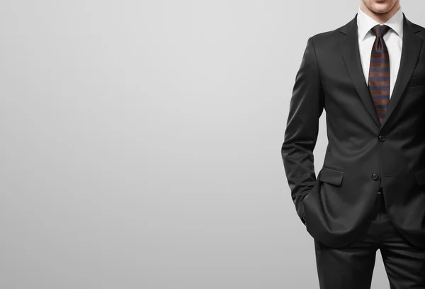 Man in suit on a white background — Stock Photo, Image