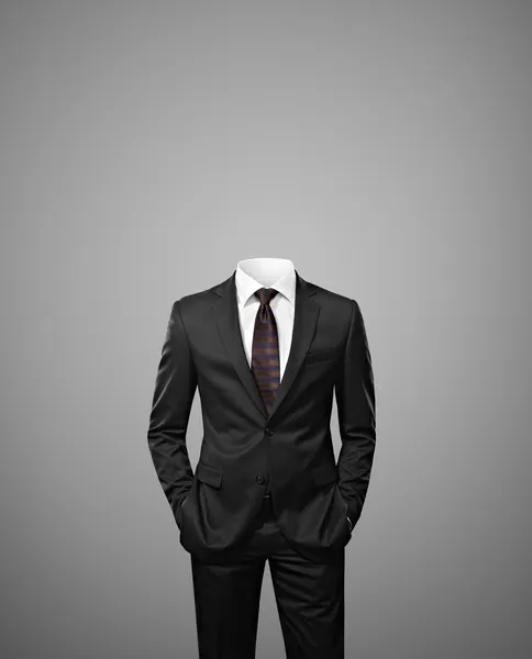 Man zonder hoofd op grijze achtergrond — Stockfoto