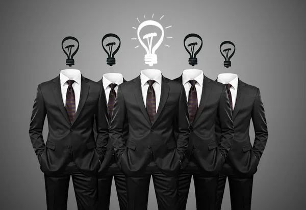 Group of businessmen with bulbs instead of heads — Stockfoto