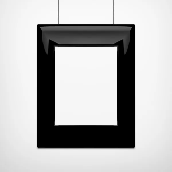 Black picture frame on a white wall — Stock Photo, Image