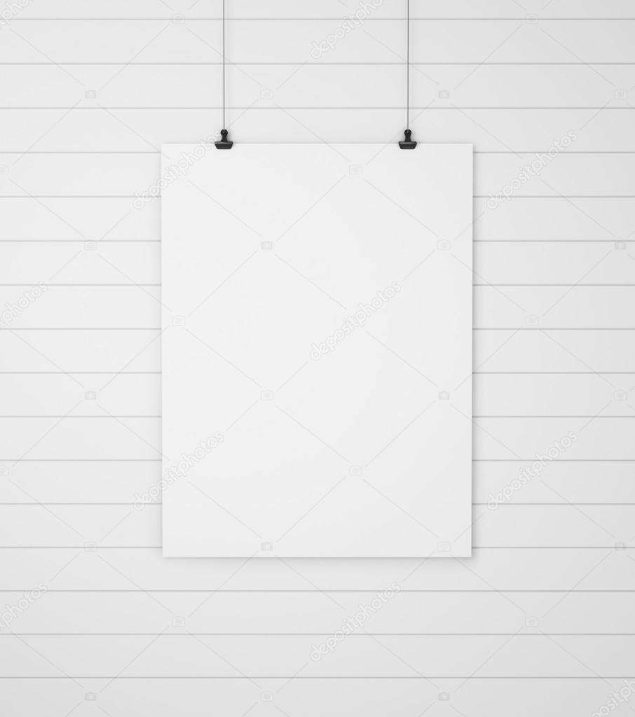 blank paper with clips on wood background