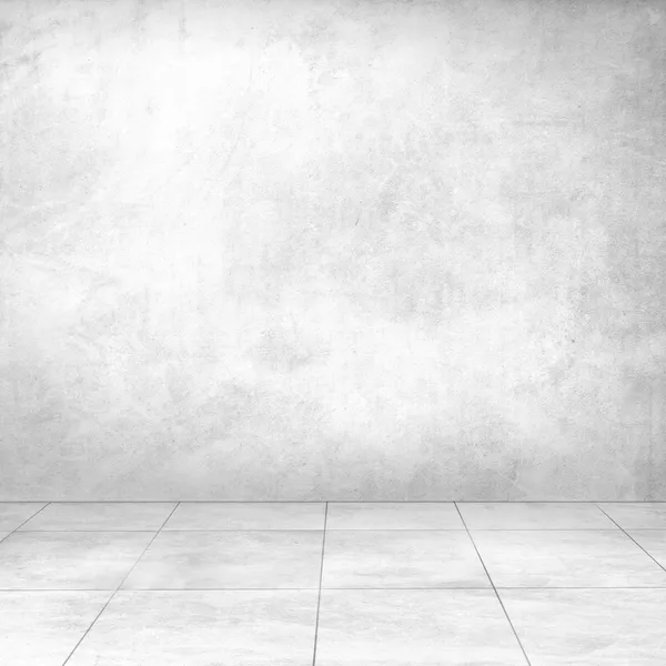Weiße Betonwand und keramischer Fliesenboden — Stockfoto
