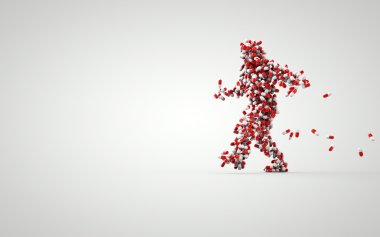 Man silhouette made from red pills.