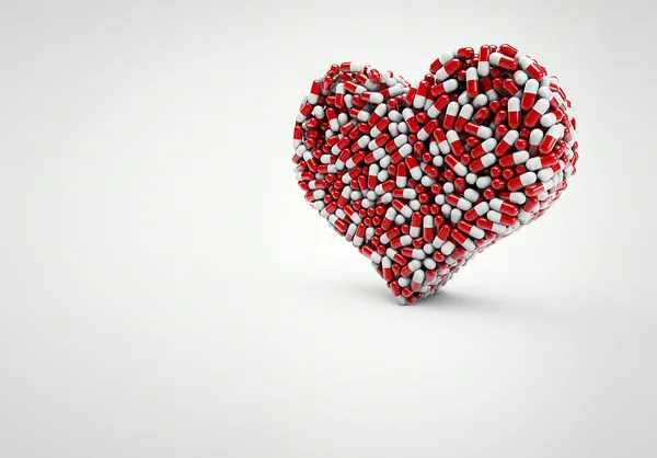 Forma del corazón hecha por píldoras —  Fotos de Stock