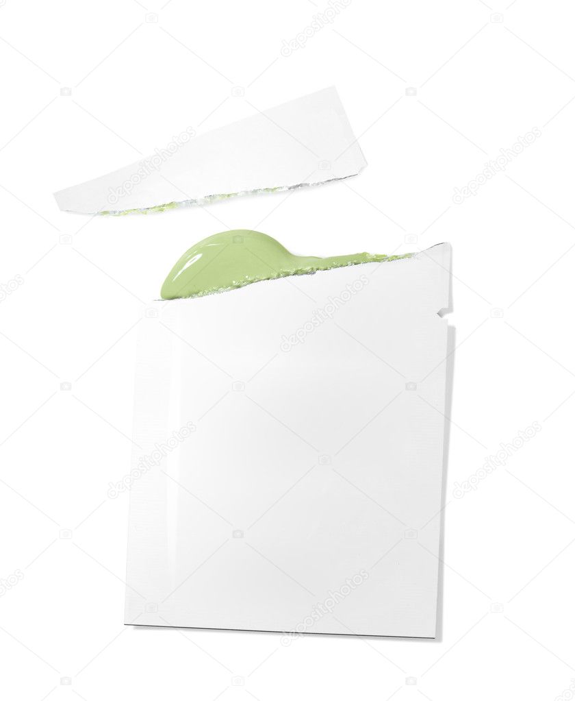 open sample pack with green primer isolated on white
