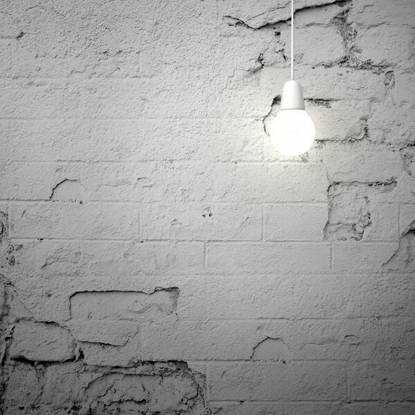 Белая лампа на потрескавшейся стене
