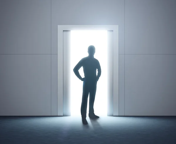 Businessman and modern elevator with opened doors — Stock Photo, Image