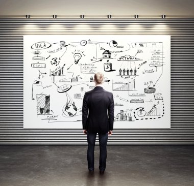 Man looking at business strategy