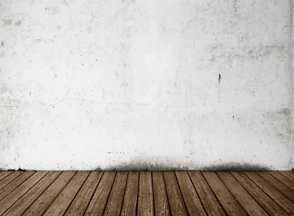 コンクリートの壁と木製の床 — ストック写真