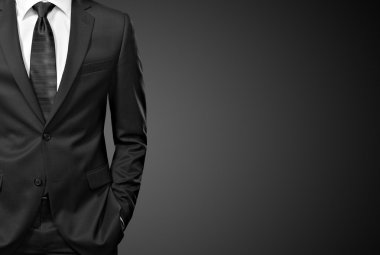 Man in the suit on black clipart