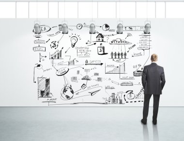 Man looking at business strategy