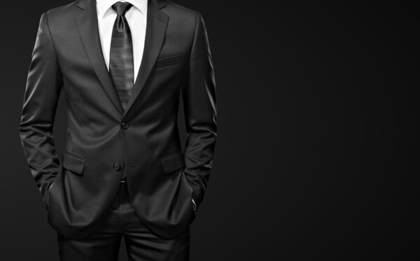 Man in the suit on black