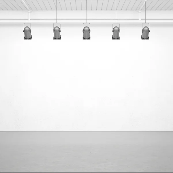 Lâmpadas em uma parede branca — Fotografia de Stock