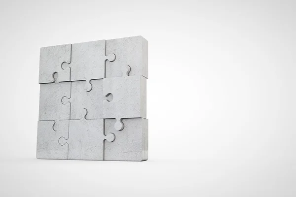 Blank jigsaw puzzle made of stone — Stock Photo, Image