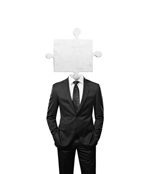 Businessman with puzzle piece instead head — Stock Photo, Image