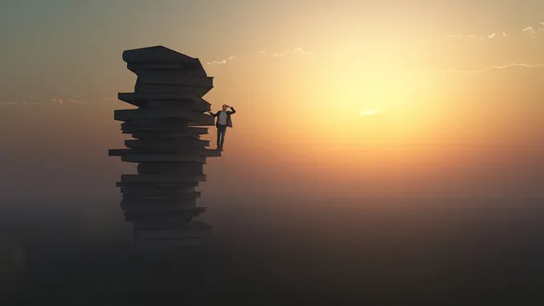 Επιχειρηματίας που στέκεται πάνω σε μια στοίβα από βιβλία — Φωτογραφία Αρχείου