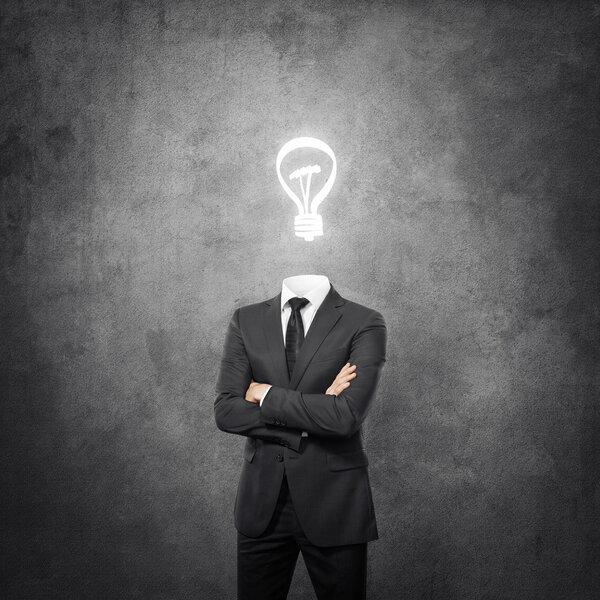 Businessman with bulb instead of head