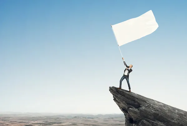 Homem com bandeira em branco — Fotografia de Stock