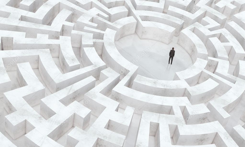 Businessman at the center of the maze